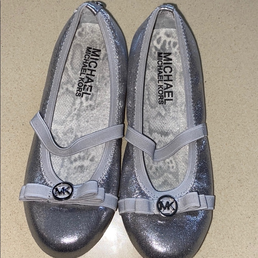Brand new Michael Kors silver ballet flats USA 12